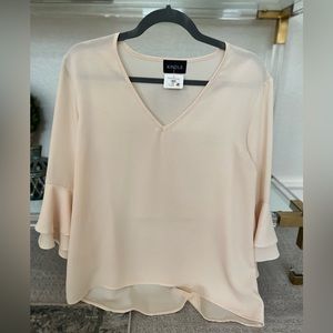 Cream colored bell sleeve top